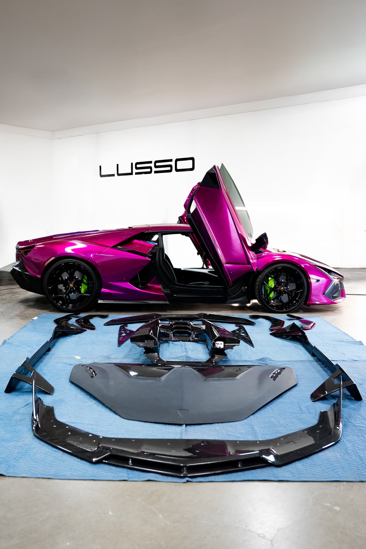 Lamborghini Revuelto with its carbon body kit laid out inside the Lusso Auto Design shop in Las Vegas