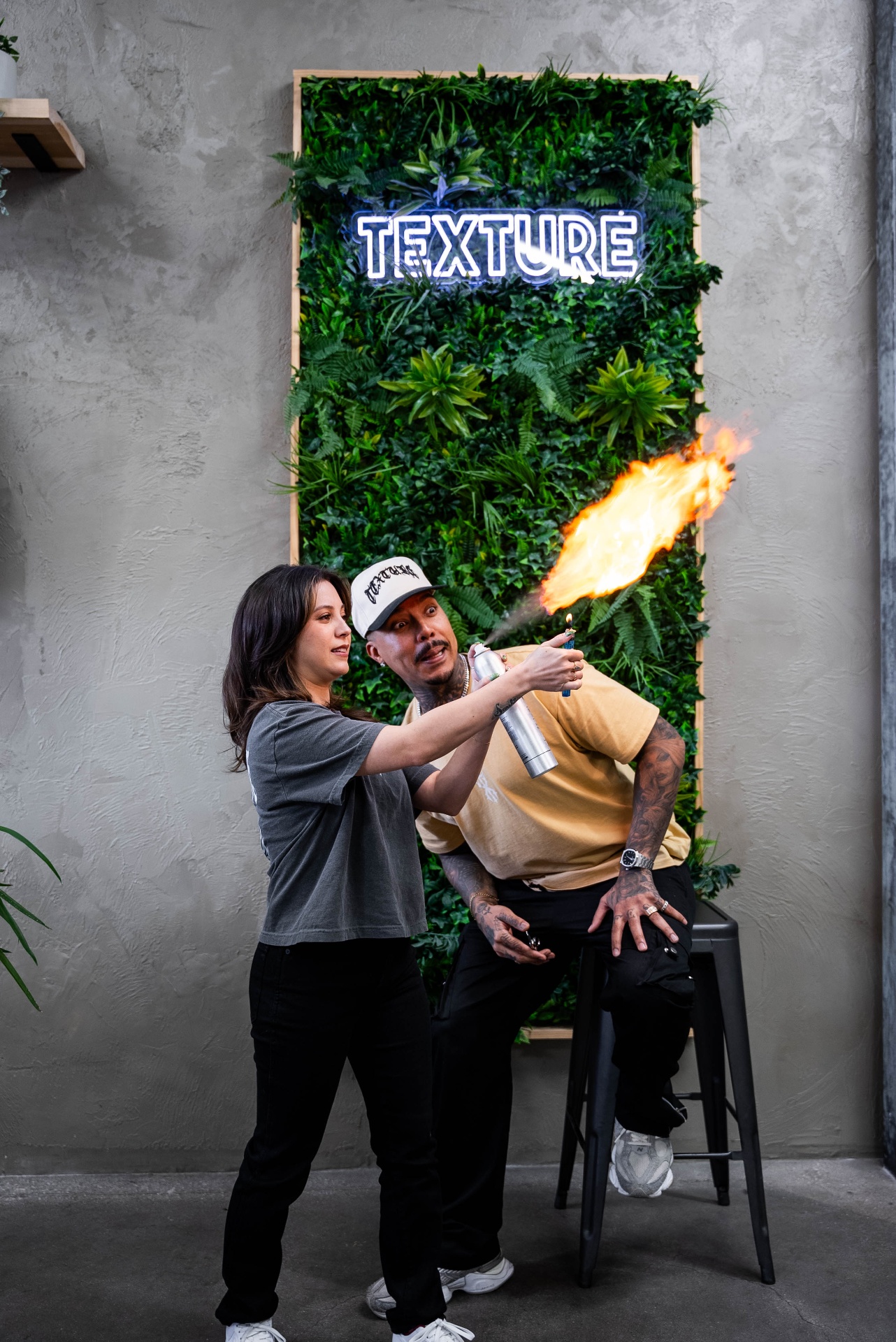 Barber using a flame technique photographed at Texture Barbershop in Las Vegas